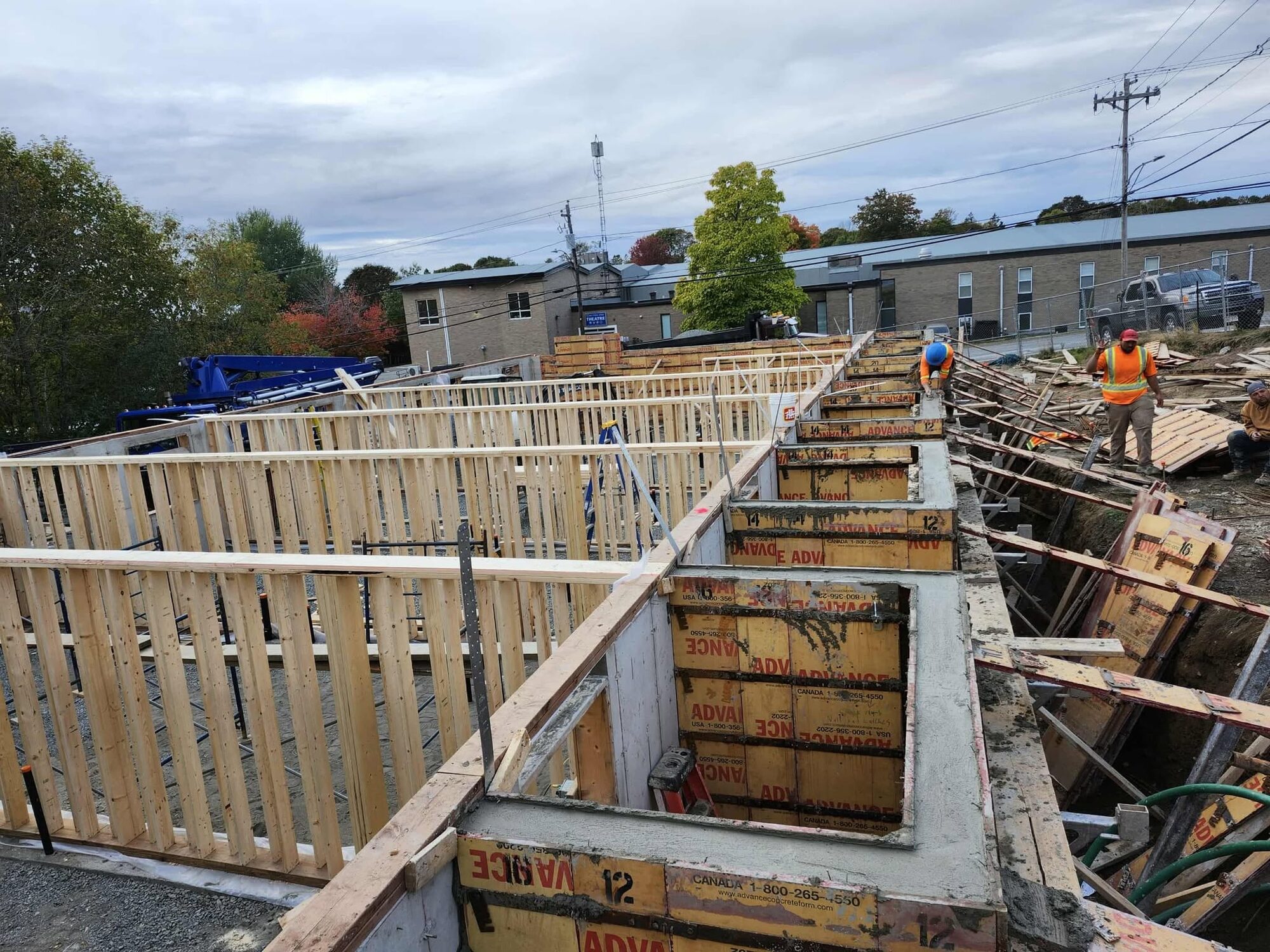 Formwork for twelve-foot concrete walls at the St. Andrews employee housing site