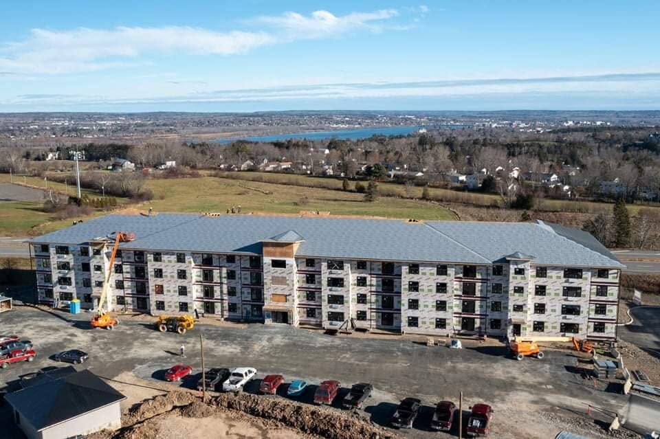 Four-storey, 66-unit rental building at Patience Lane framed and roofed
