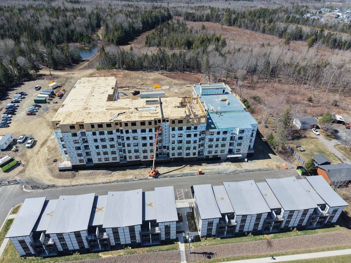 Aerial view of the complex in context with the surrounding development