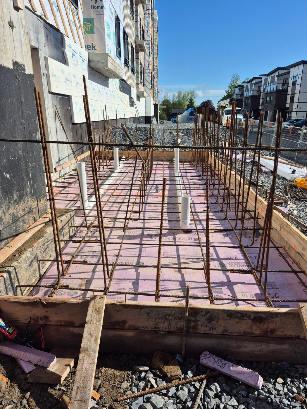 Formed and tied footing running along the building line