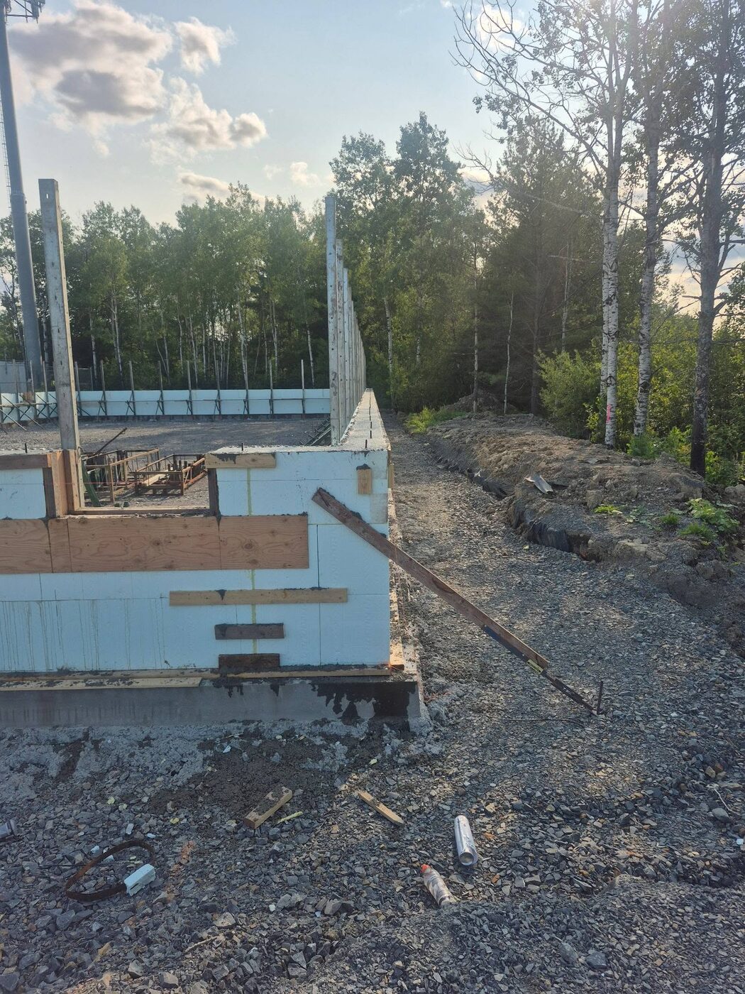 Poured foundation wall corner with the forms stripped