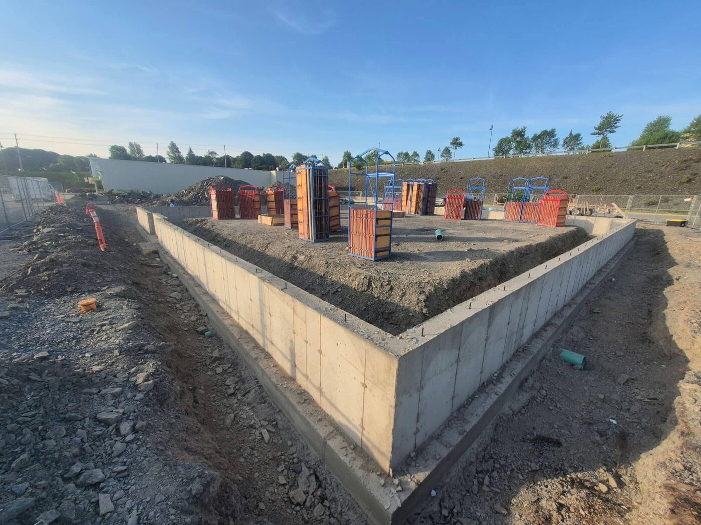 Formed frost walls and column piers around the building footprint